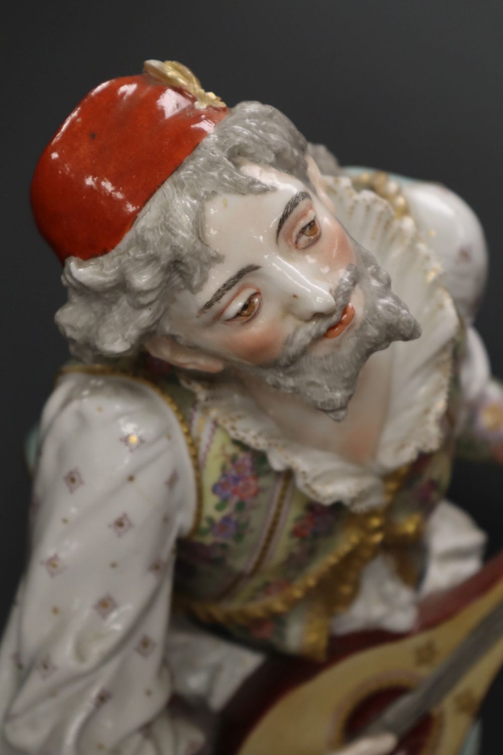 A pair of large 19th century Paris porcelain figures of a mandolin player and a woman dancer, printed anchor mark, 63.5cm